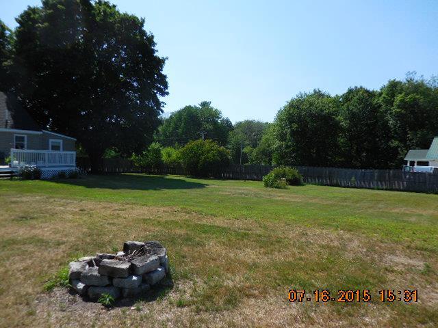 1240 New County Road Dayton, ME 04005 - Photo 23 of 28 Back Yard Fire Pit