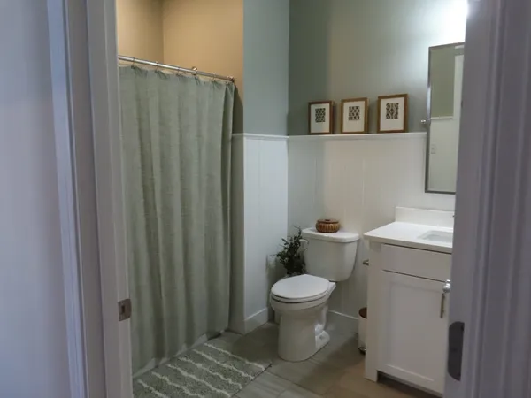 a bathroom with a sink and toilet