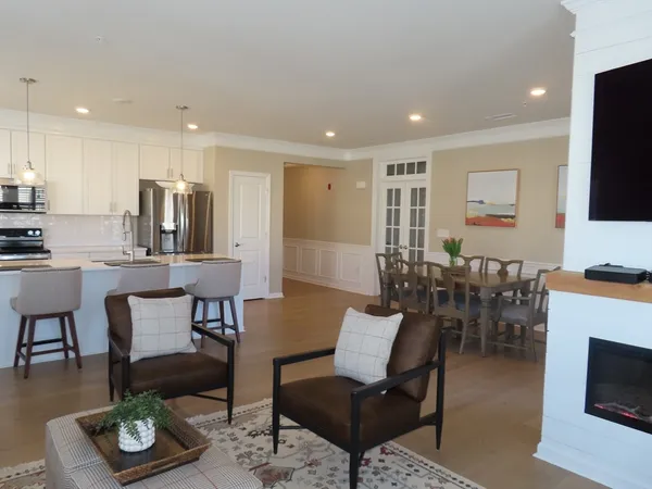 a view of kitchen with dining table and chairs