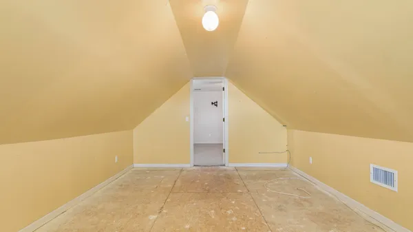 a view of a room with an empty space