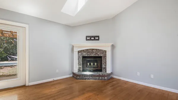 a living room with a fireplace