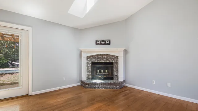 a living room with a fireplace