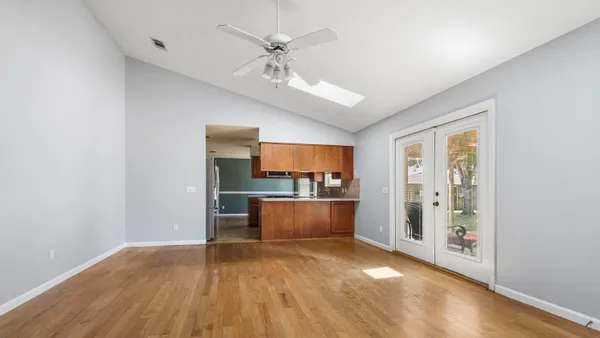 a view of a room with a flat screen tv