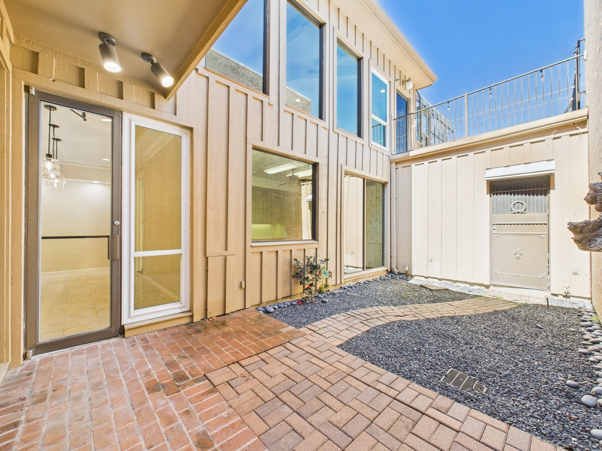 7608 Del Monte Drive Houston, TX 77063 - Photo 11 of 46 Atrium plants didn't survive the freeze but thrive in this space