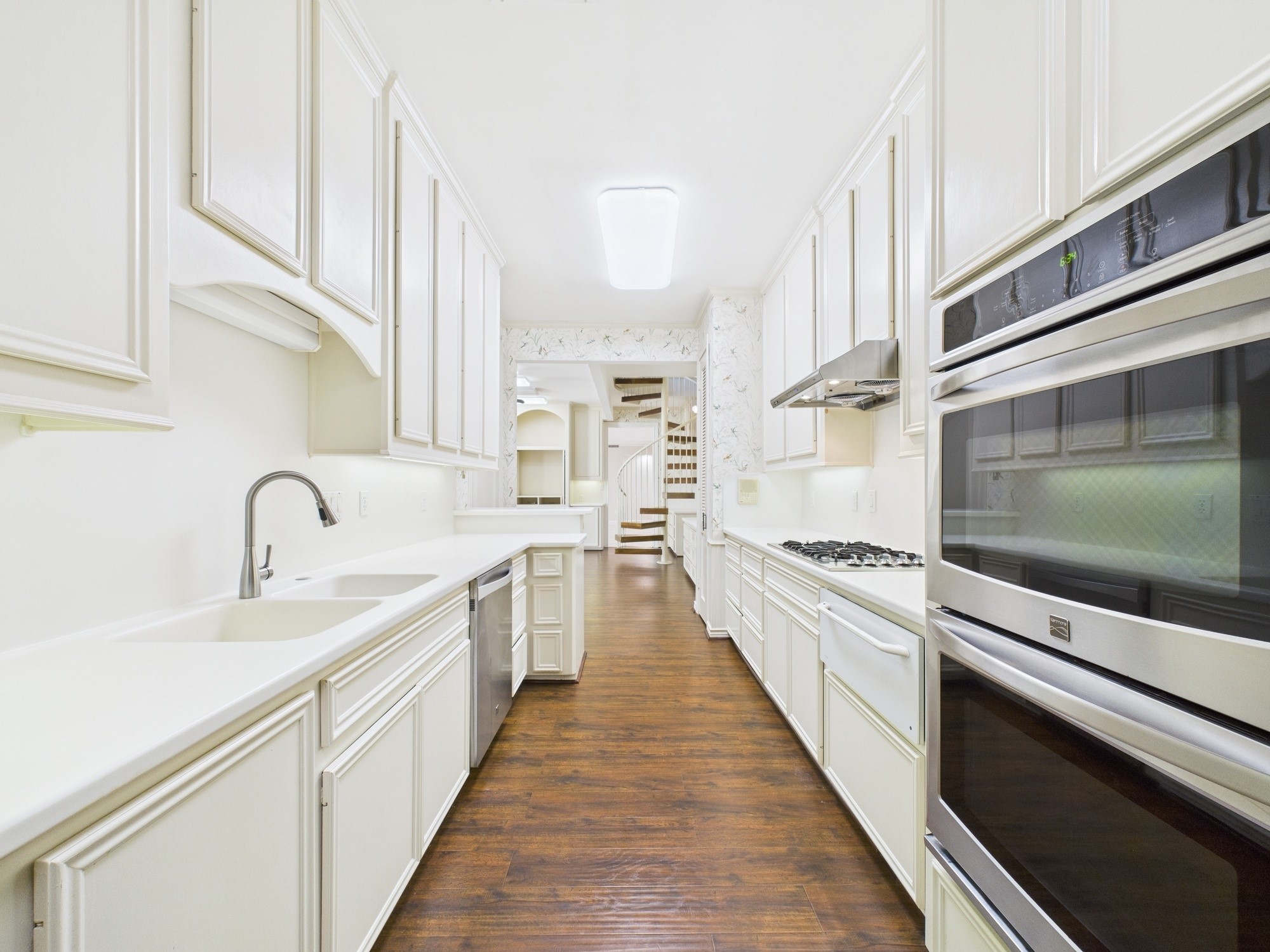 7608 Del Monte Drive Houston, TX 77063 - Photo 19 of 46 Custom Corian counters/sinks, SS appliances, range and wall oven