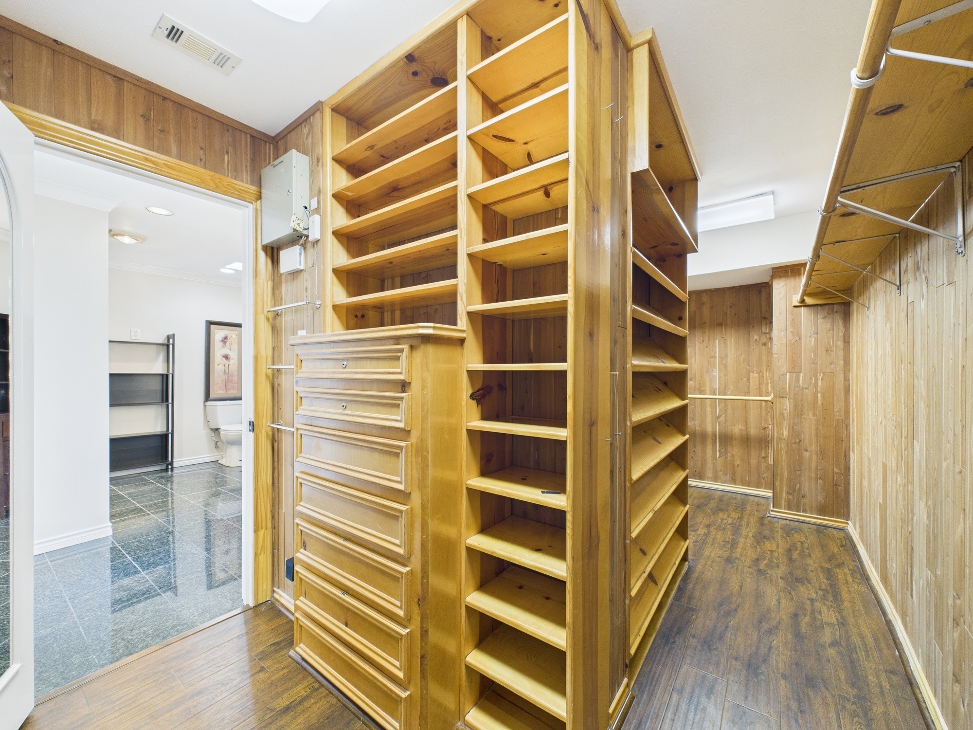 7608 Del Monte Drive Houston, TX 77063 - Photo 26 of 46 Custom cedar walk-in with built-ins for jewelry, watches, shoes and more