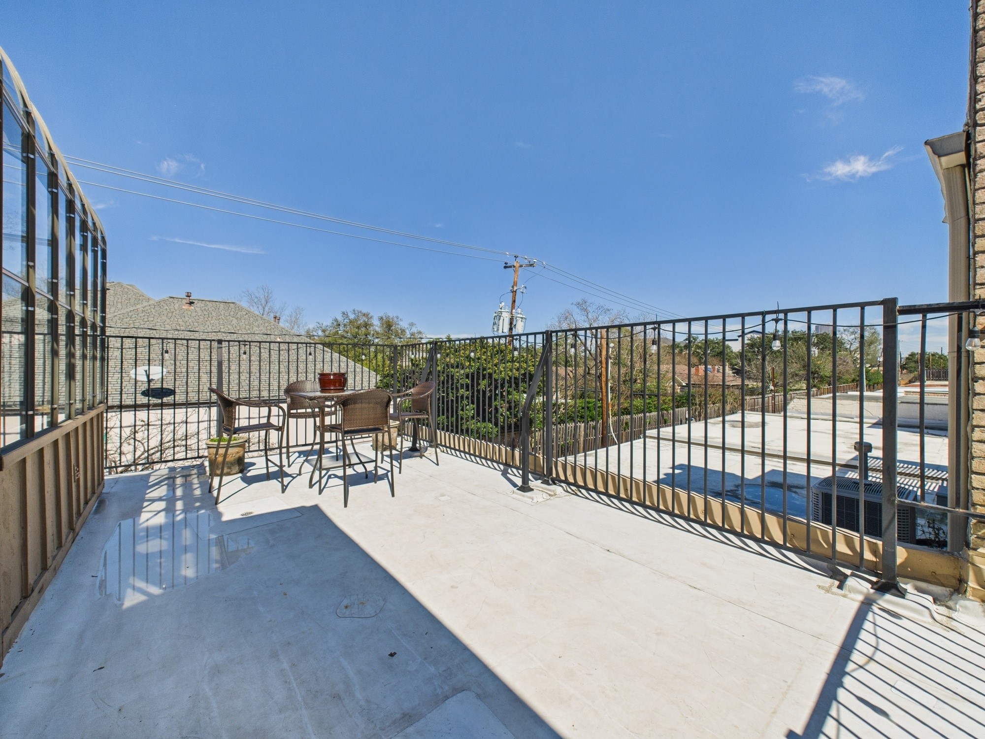 7608 Del Monte Drive Houston, TX 77063 - Photo 41 of 46 Just beyond the Media/Game Room is the outdoor patio