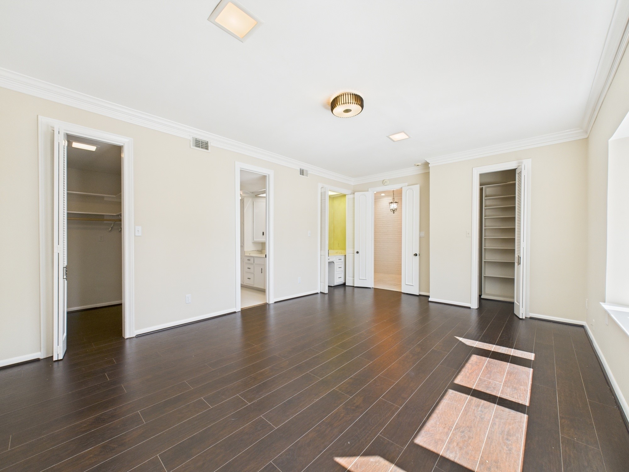 7608 Del Monte Drive Houston, TX 77063 - Photo 5 of 46 Generous primary bedroom with two large walk-in closets, primary bath and vanity/study Area