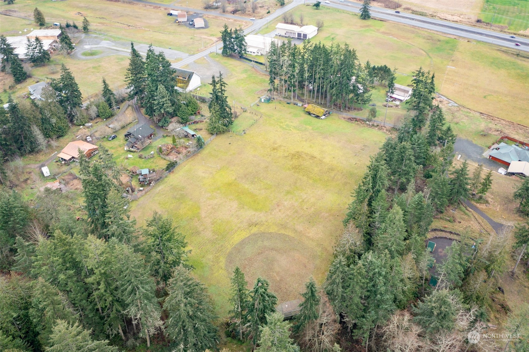 161 Lake Farm Road Port Angeles, WA 98362 - Photo 1 of 40 a view of a swimming pool next to a lake view