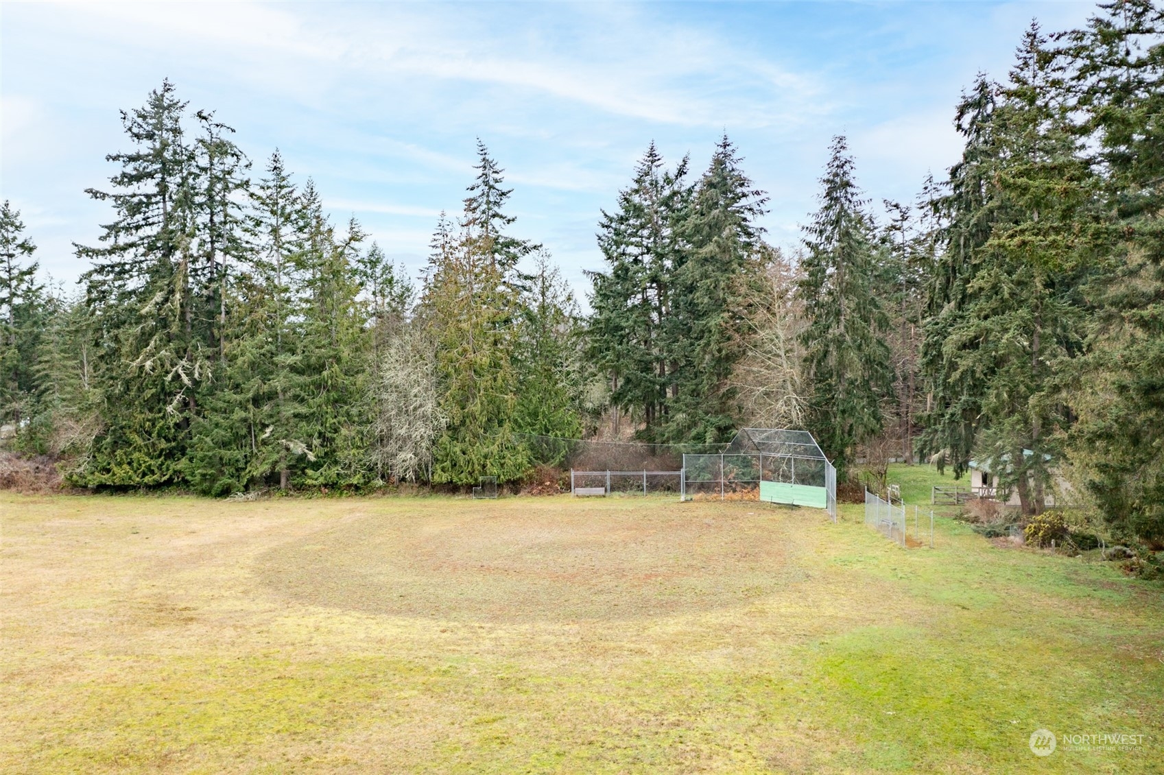 161 Lake Farm Road Port Angeles, WA 98362 - Photo 38 of 40 a view of outdoor space with swimming pool and trees in the background