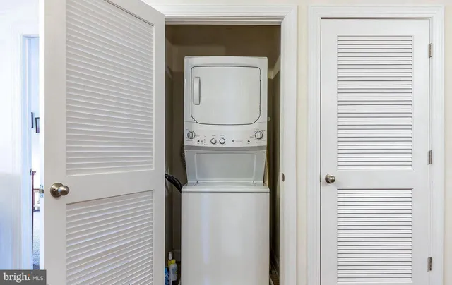 a view of a hallway with front door