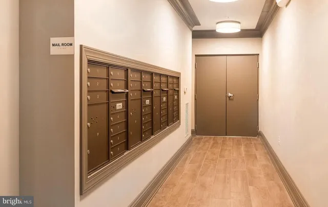 a view of hallway with a large mirror