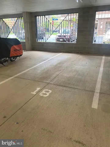 a kitchen with a sink a stove and cabinets