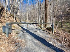 0 Carter Road Clyde, NC 28721 - Photo 2 of 17 a view of a backyard with wooden fence