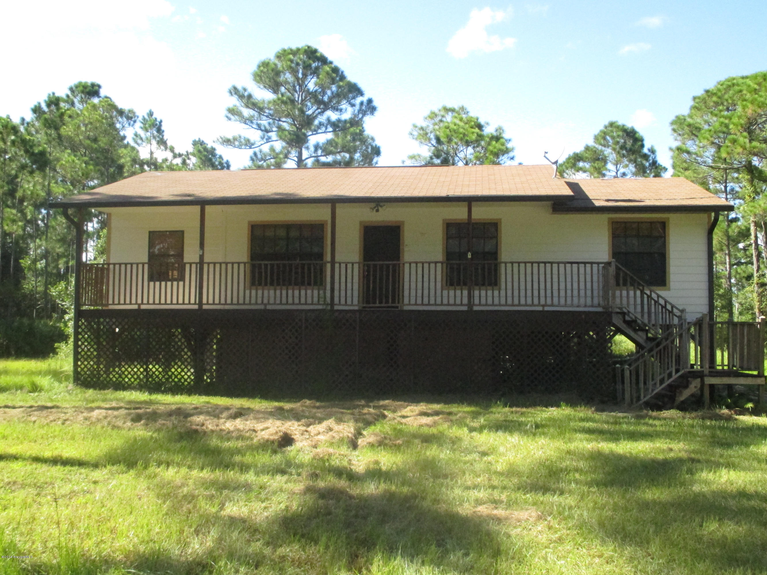 1320 Flatwoods Road Mims, FL 32754 - Photo 1 of 14 Front