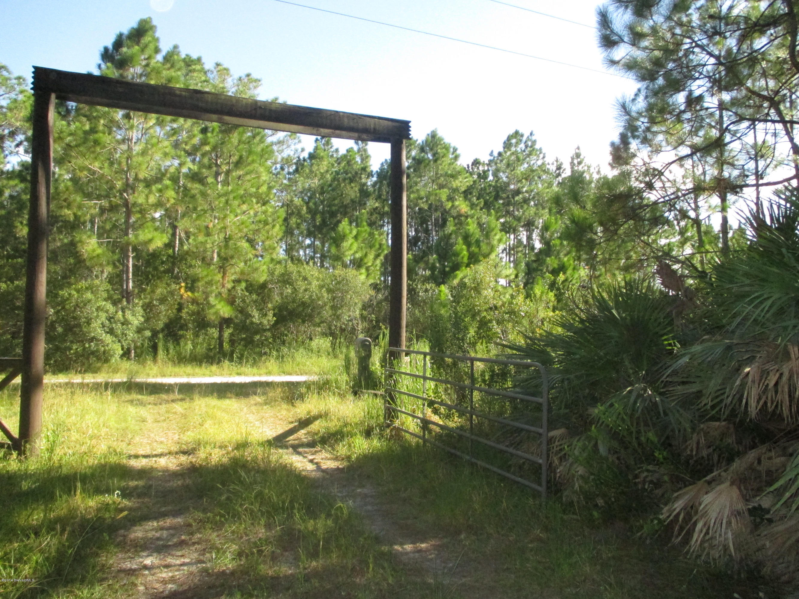 1320 Flatwoods Road Mims, FL 32754 - Photo 14 of 14 Gated Entrance