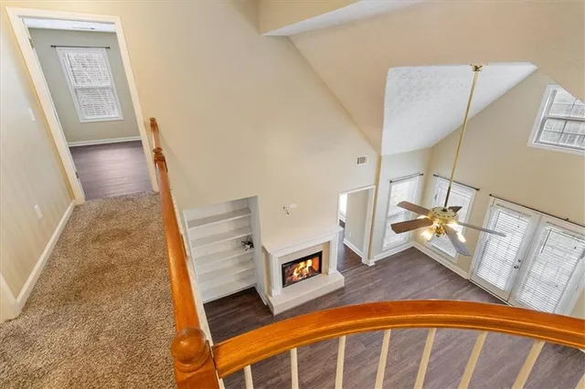 a view of a hallway with seating area