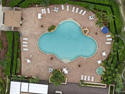 an aerial view of a house with a garden