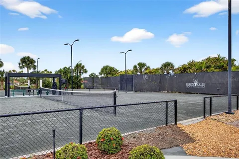 a view of a house with a outdoor space and porch