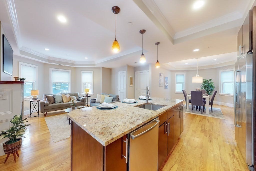 201 Pearl Street, Unit 2 Cambridge, MA 02139 - Photo 7 of 16 a view of a kitchen and dining room