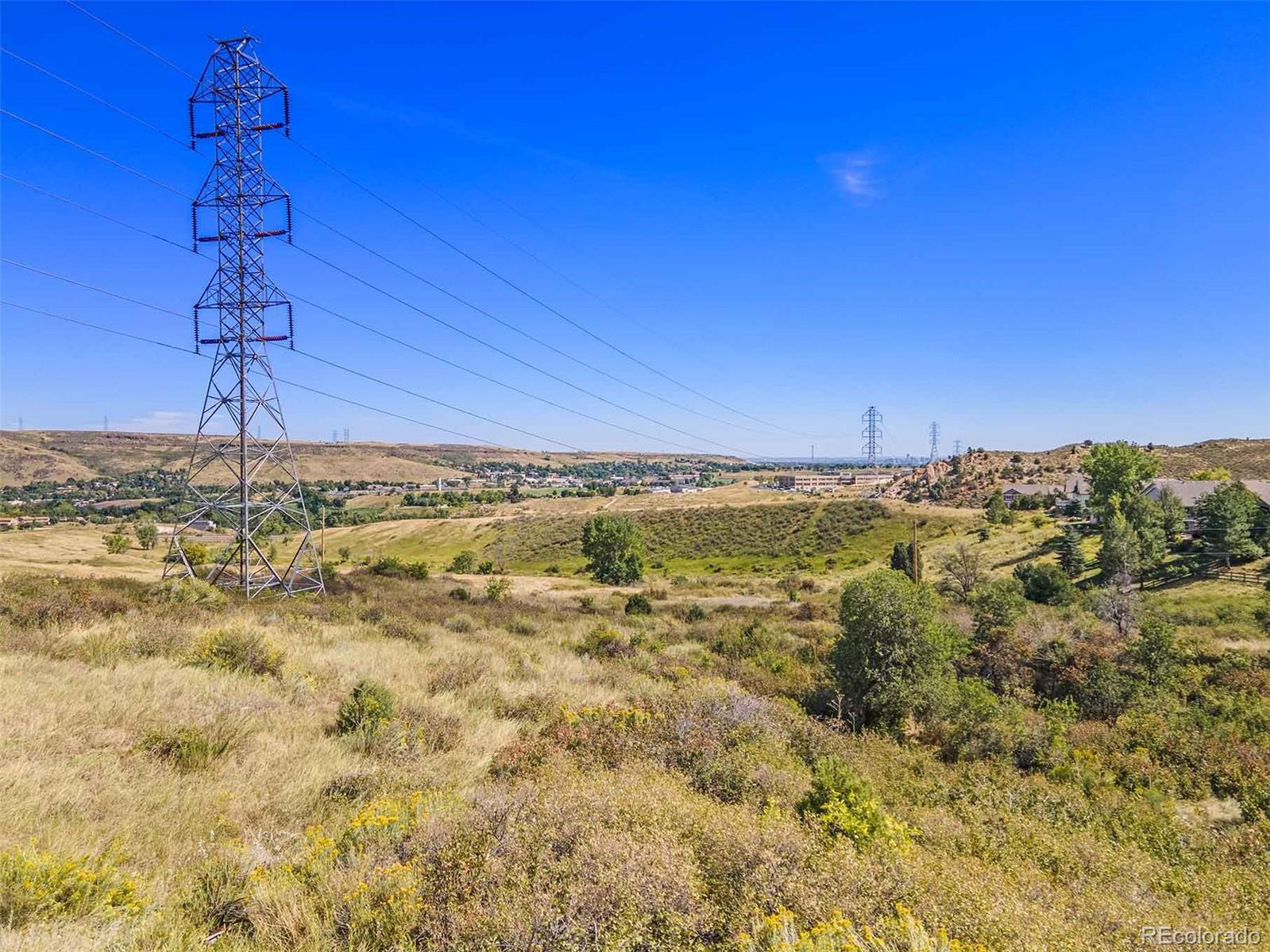 853 Shelton Road Golden, CO 80401 - Photo 12 of 29 a view of a big room with a ocean view