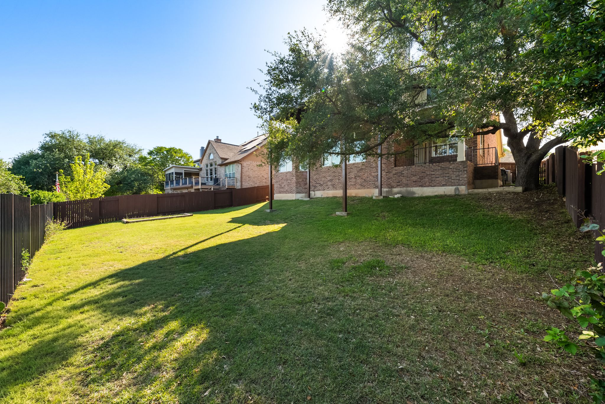 2708 Rio Mesa Drive Austin, TX 78732 - Photo 30 of 40 a view of a house with a yard