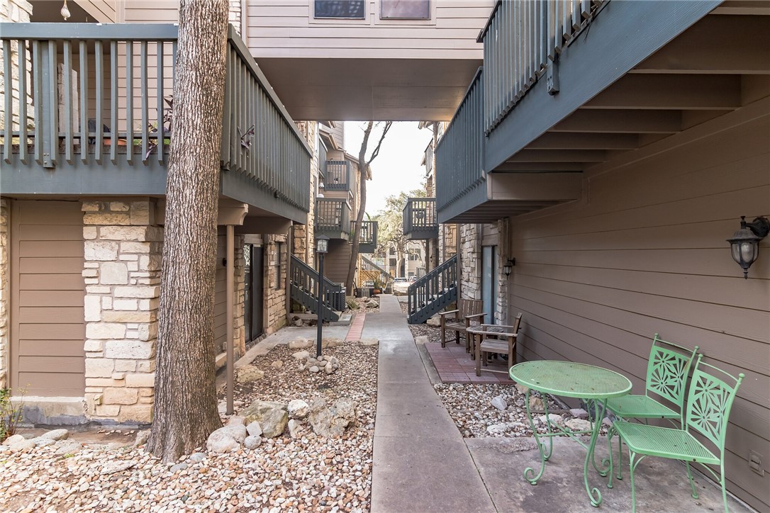 3627 Menchaca Road, Unit 112 Austin, TX 78704 - Photo 22 of 25 Just past the pool, go down this sidewalk to get to #112. It is the 1st entry way on your left.