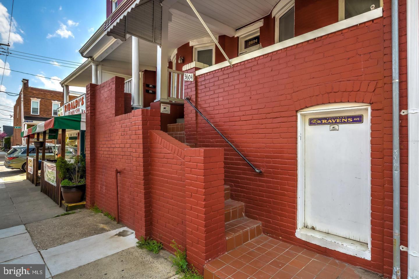 3600 Keswick Road, Unit B Baltimore, MD 21211 - Photo 2 of 6 Exterior Stairs that Lead to Porch