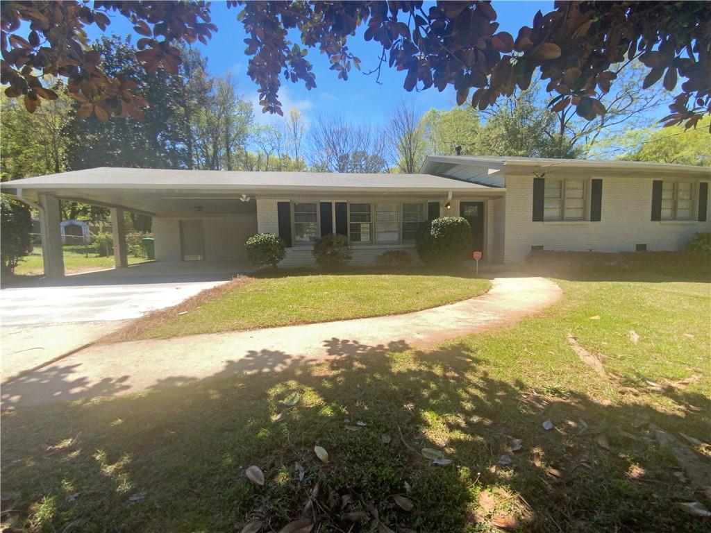 3337 Irish Lane Decatur, GA 30032 - Photo 1 of 1 a view of a house with a yard