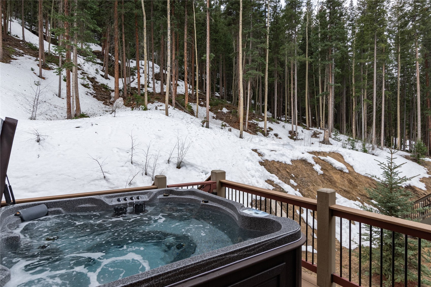 750 Independence Road, Unit 2C Keystone, CO 80435 - Photo 33 of 49 Hot tub on back deck with privacy