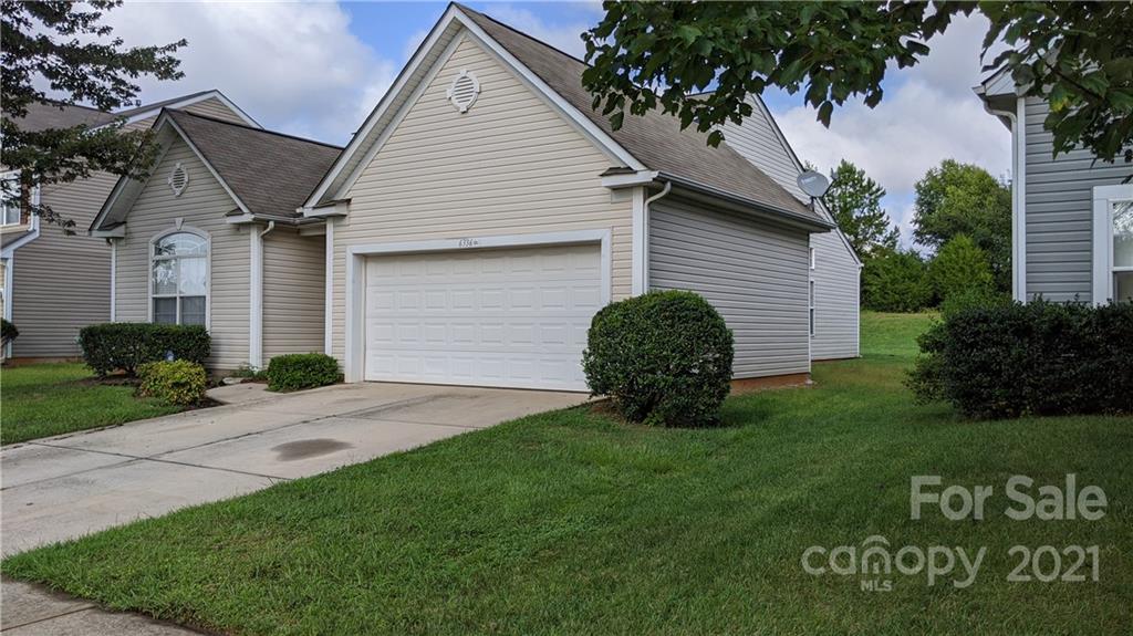 6336 Trotters Ridge Road Charlotte, NC 28227 - Photo 1 of 7 a front view of a house with garden