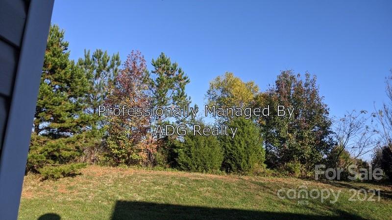 6336 Trotters Ridge Road Charlotte, NC 28227 - Photo 4 of 7 a view of a yard