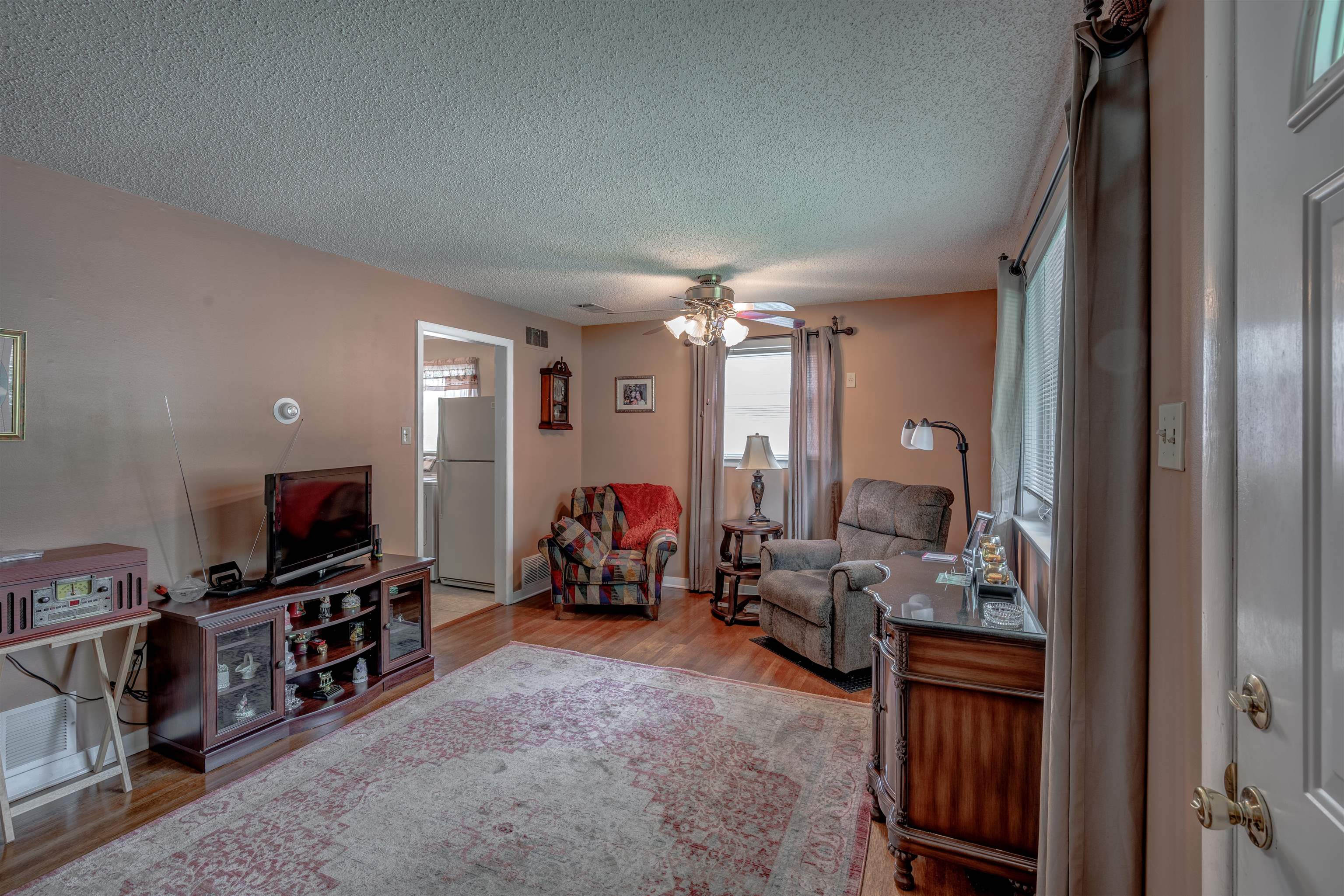 450 Malboro Road Memphis, TN 38120 - Photo 4 of 16 a living room with furniture and a flat screen tv