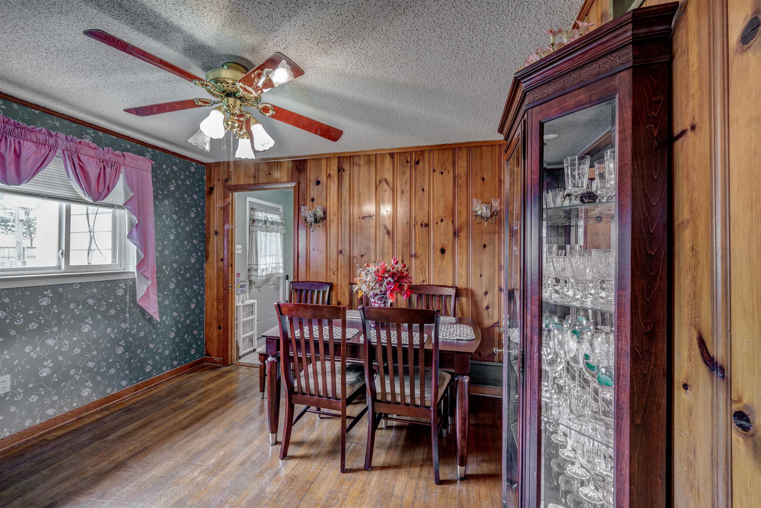 450 Malboro Road Memphis, TN 38120 - Photo 8 of 16 a view of a dining room with furniture window and wooden floor