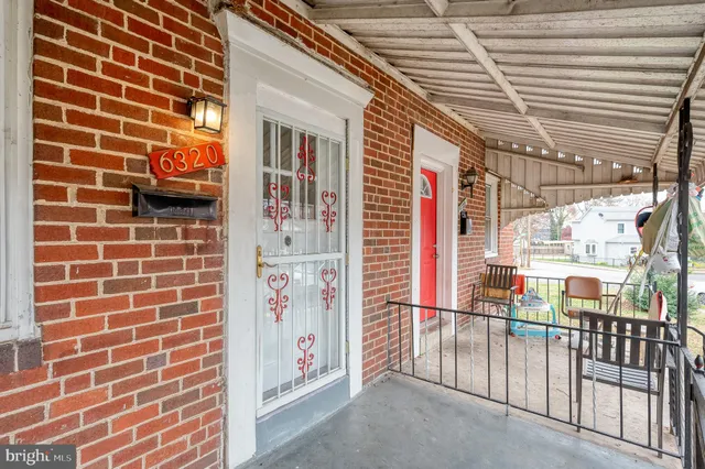 a view of a brick house with a windows