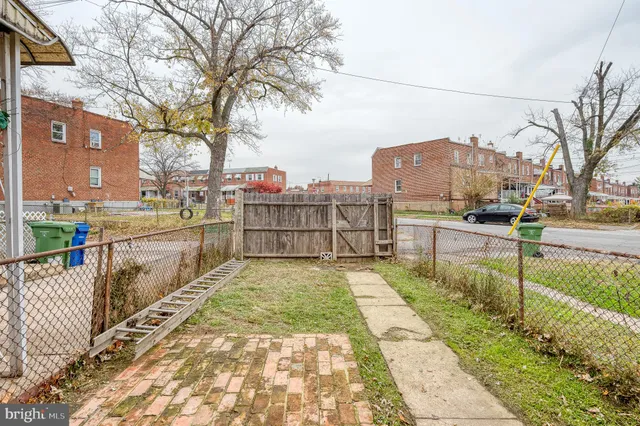 a view of a patio with a yard