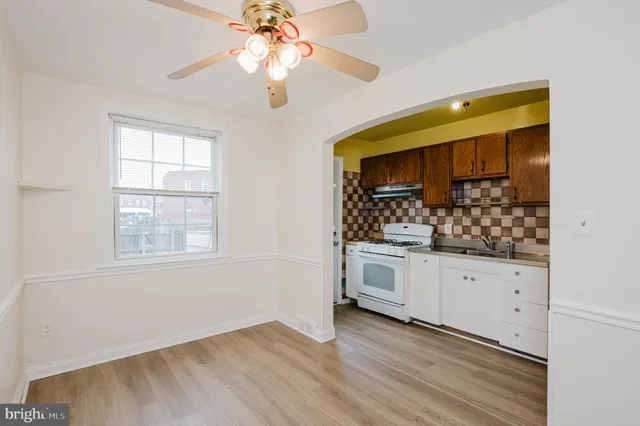 a view of cabinets and wooden floor