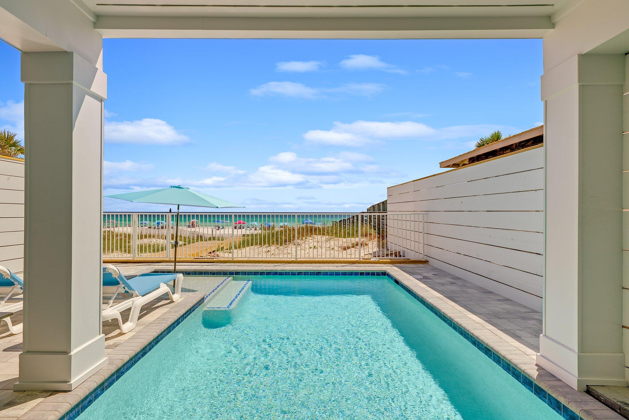 8711 Surf Drive Panama City, FL 32408 - Photo 12 of 81 12x23 Gulf Front Heated Pool