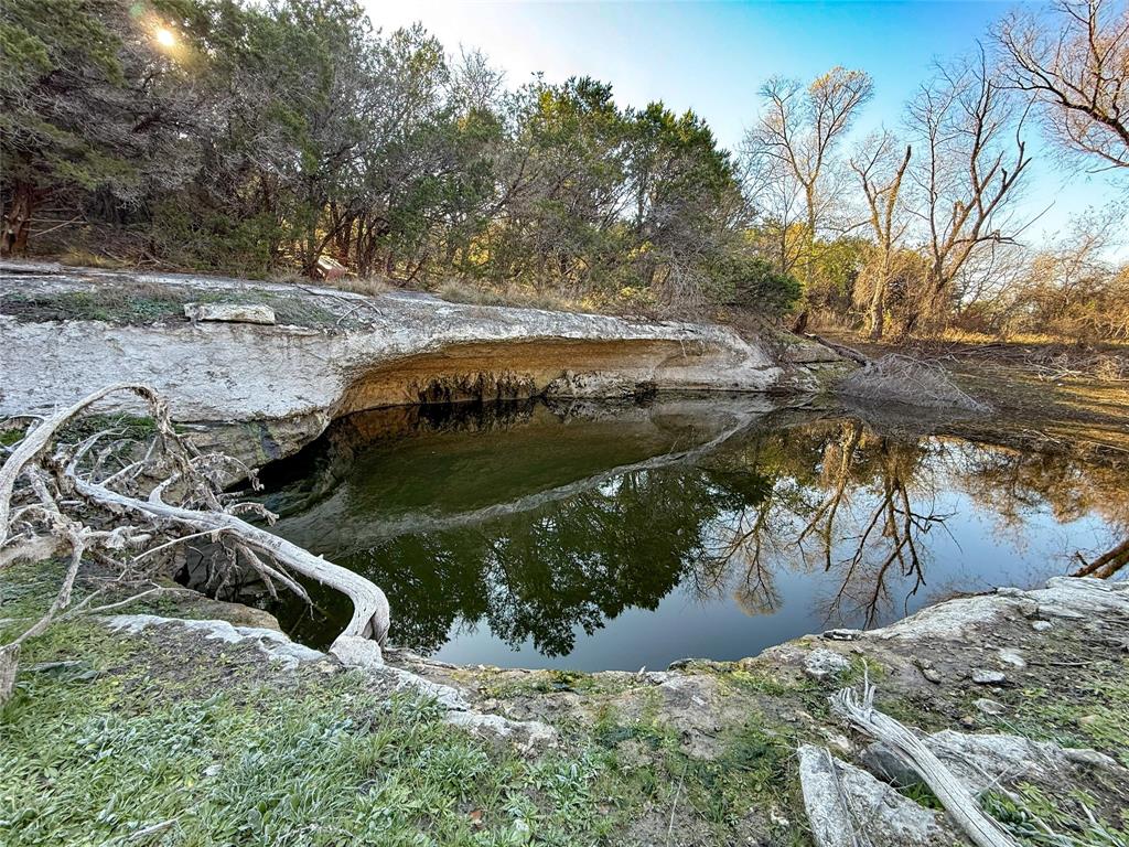3748 High Prairie Road Valley Mills, TX 76689 - Photo 10 of 21 Highland pond with natural cavern