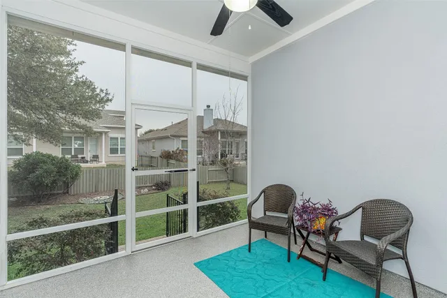 a view of house with backyard