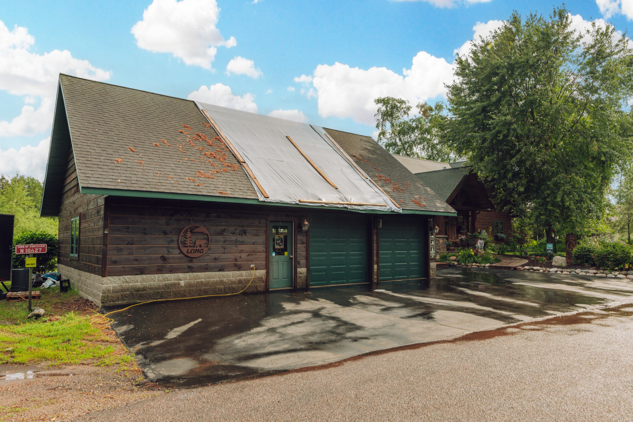 N10627 Bay View Lane Phillips, WI 54555 - Photo 65 of 74 Current Garage w storm damage