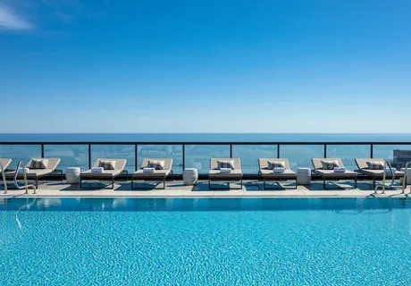 a view of a patio with swimming pool