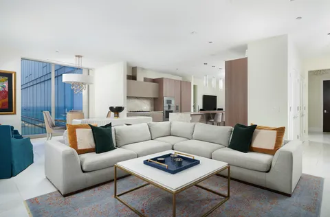 a living room with furniture and a couch