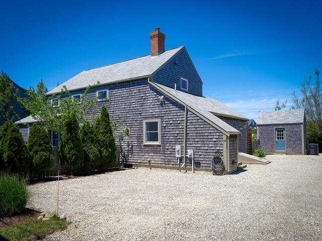 33 Bartlett Road Nantucket, MA 02554 - Photo 29 of 29 a view of a house with a yard