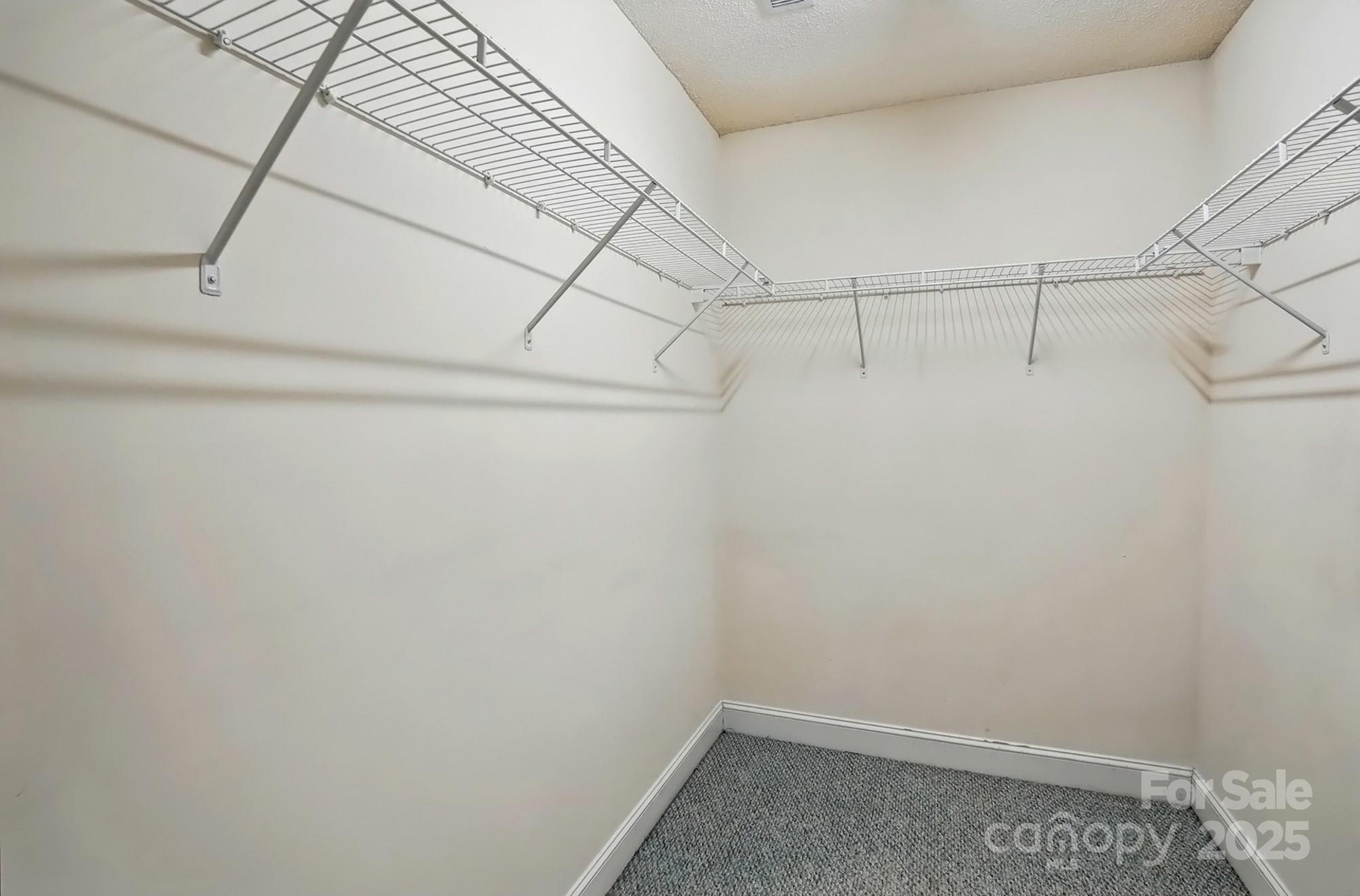 3327 Flagler Circle Midland, NC 28107 - Photo 25 of 45 a view of a room with racks on the wall
