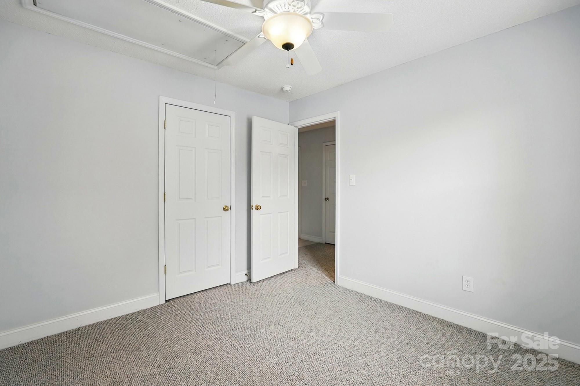 3327 Flagler Circle Midland, NC 28107 - Photo 27 of 45 a view of a livingroom with a chandelier fan