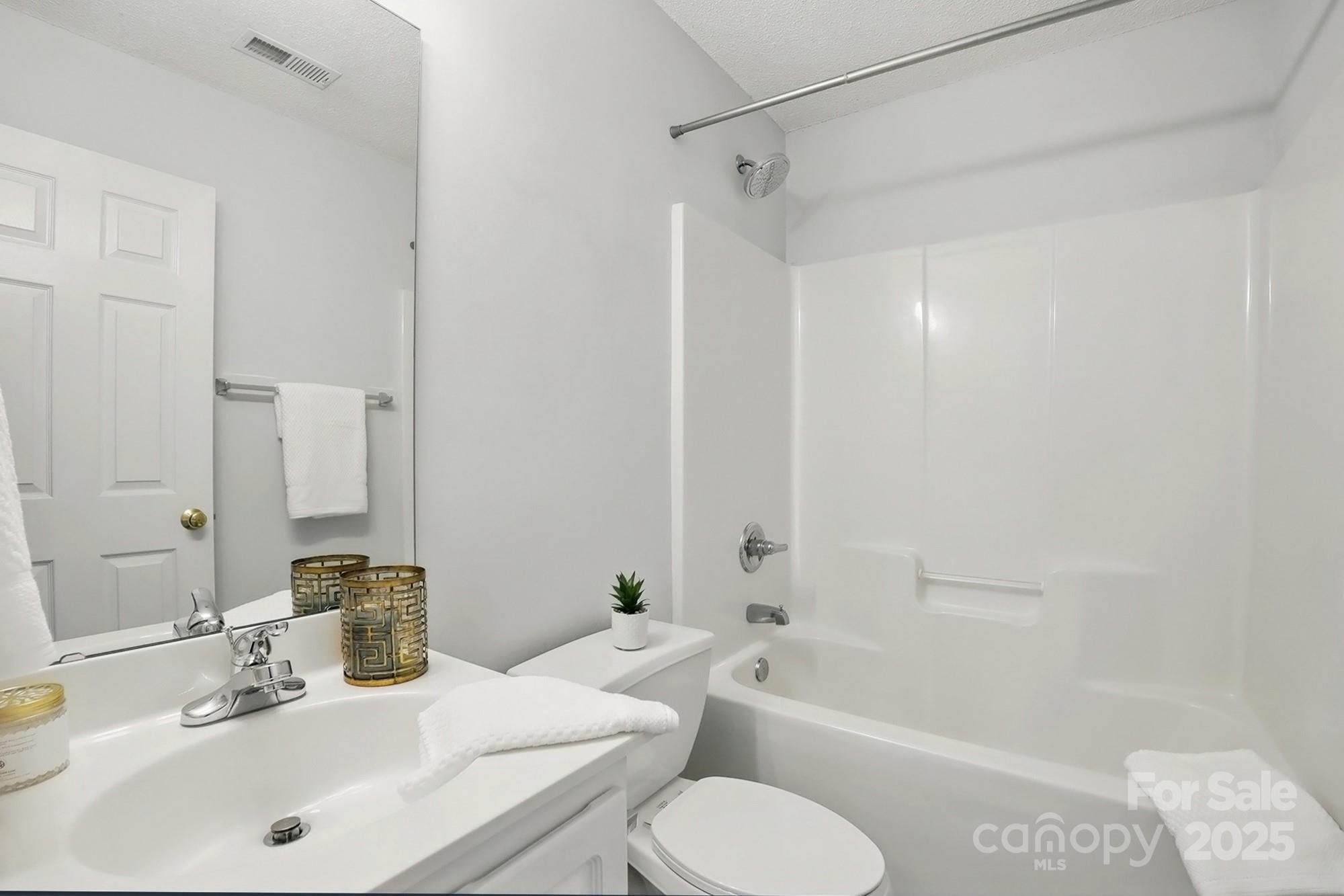 3327 Flagler Circle Midland, NC 28107 - Photo 28 of 45 a bathroom with a sink toilet and shower