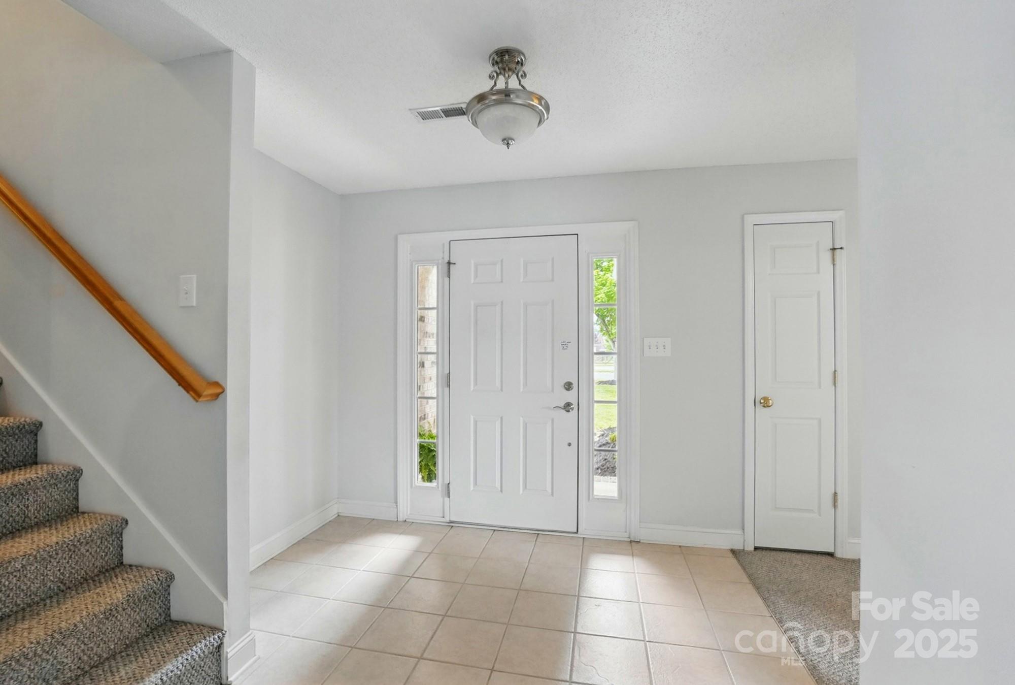 3327 Flagler Circle Midland, NC 28107 - Photo 7 of 45 a view of an entryway with front door