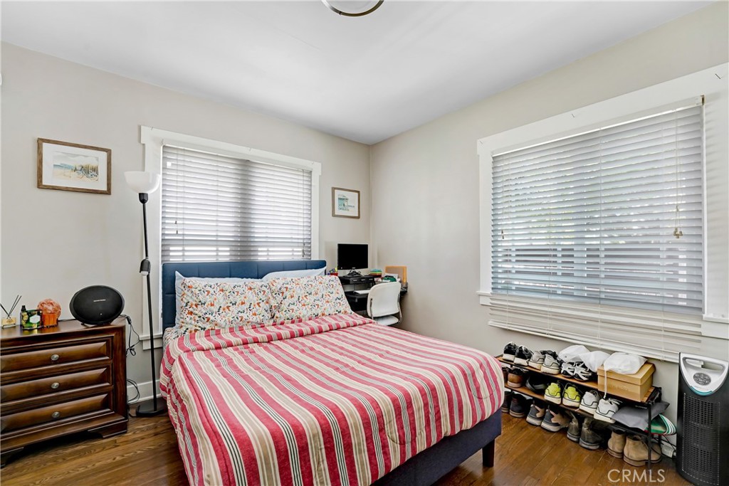 1982 Corson Street Pasadena, CA 91107 - Photo 11 of 30 a bedroom with a bed and a window