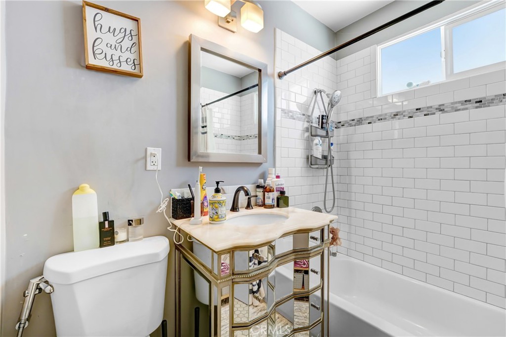 1982 Corson Street Pasadena, CA 91107 - Photo 12 of 30 a bathroom with a sink and a mirror